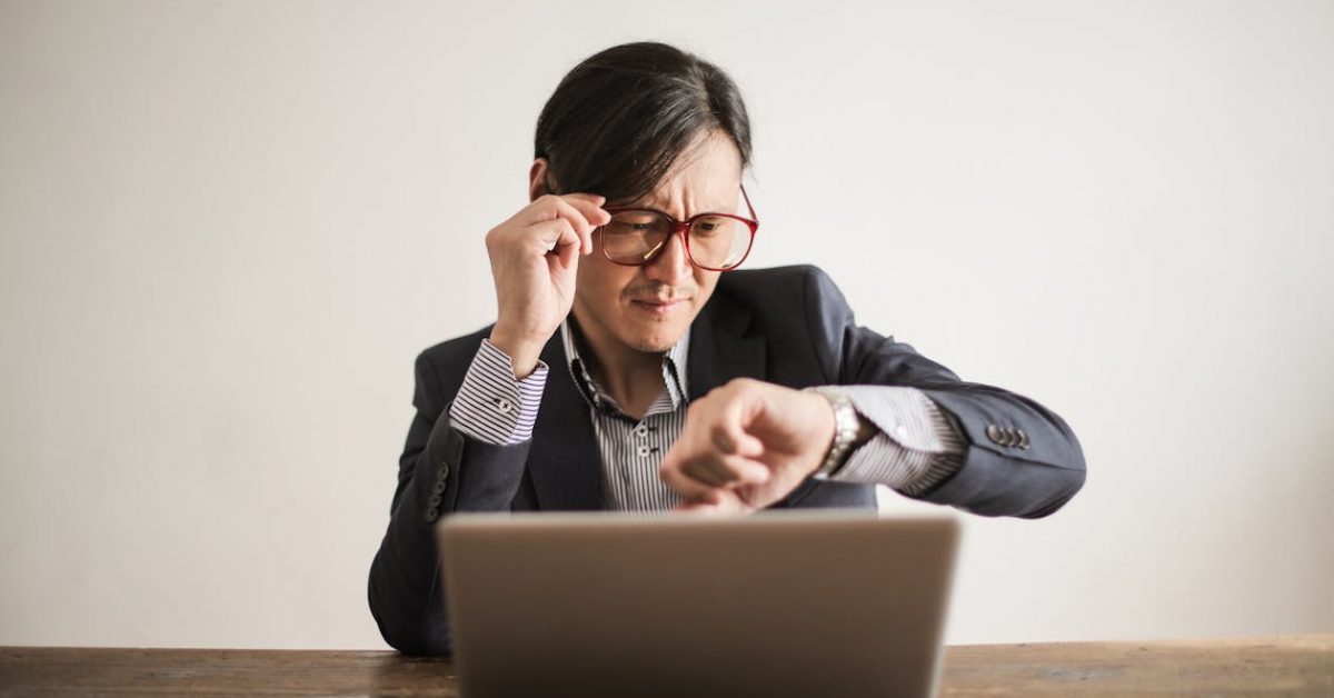 Overwhelmed officer facing notification overload - probation GPS monitoring alert fatigue