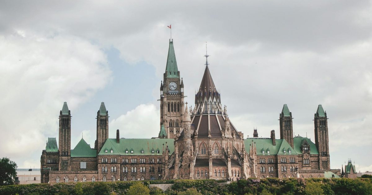 Canadian Parliament Hill architecture, Ottawa — Pexels stock image illustrating Canadian government corrections and electronic monitoring policy context.