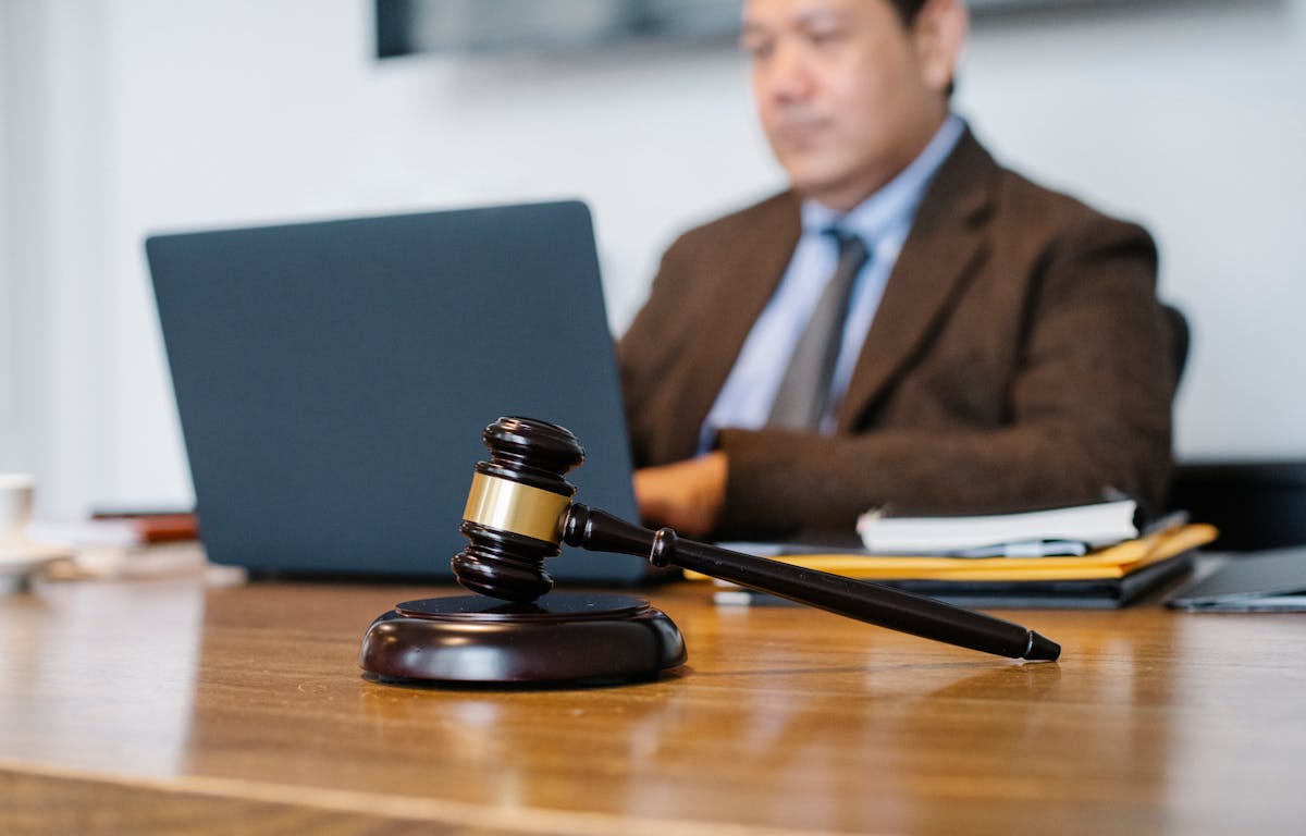 GPS electronic monitoring ankle bracelet for parole supervision in Trinidad and Tobago Caribbean corrections