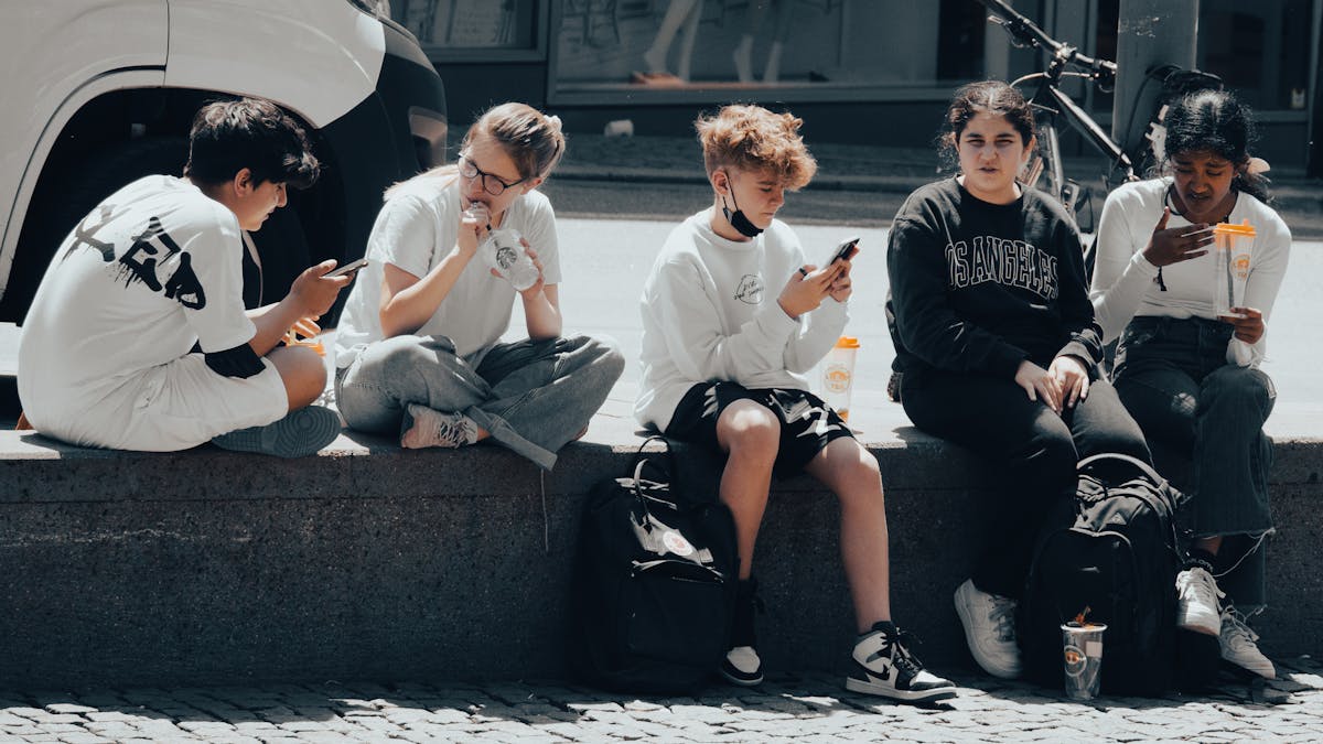 Teenagers in urban environment as Sweden targets youth gang recruitment with electronic bracelet monitoring