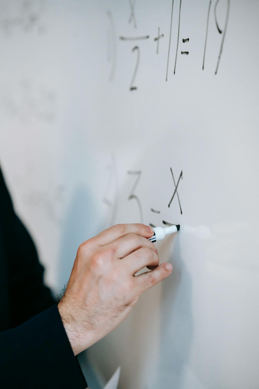 Instructor teaching vocational skills in a classroom setting - rehabilitation programs reduce recidivism